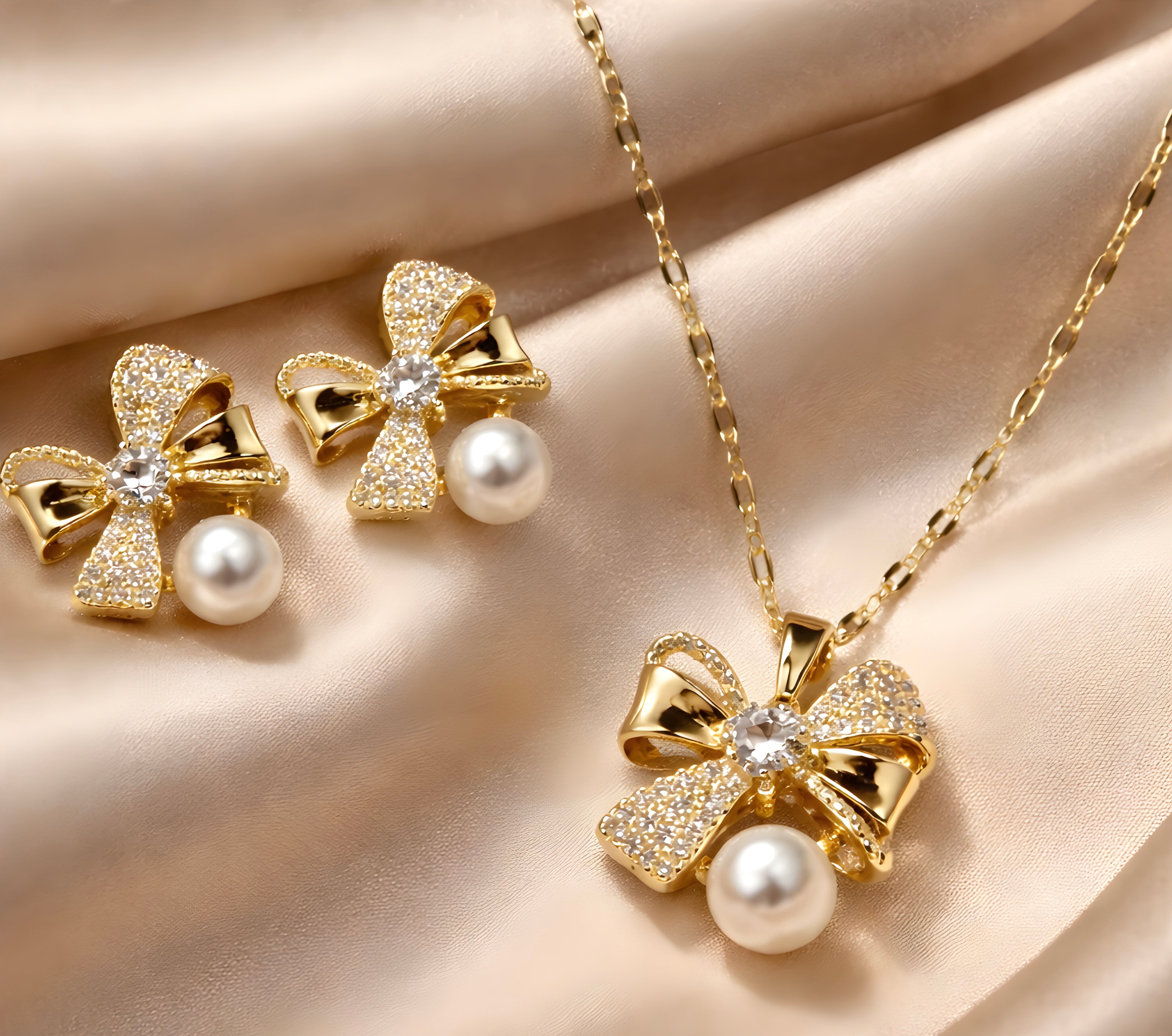 Gold-toned bow pendant set