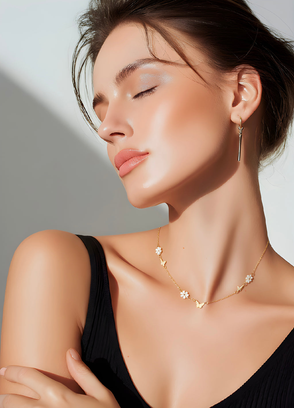 Gold-plated butterfly and floral pendant necklace