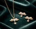 Gold angel wing pendant set