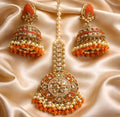 Orange kundan earrings tikka set