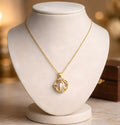 Gold-toned cage pendant