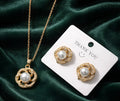 Pearl and gold-toned pendant set
