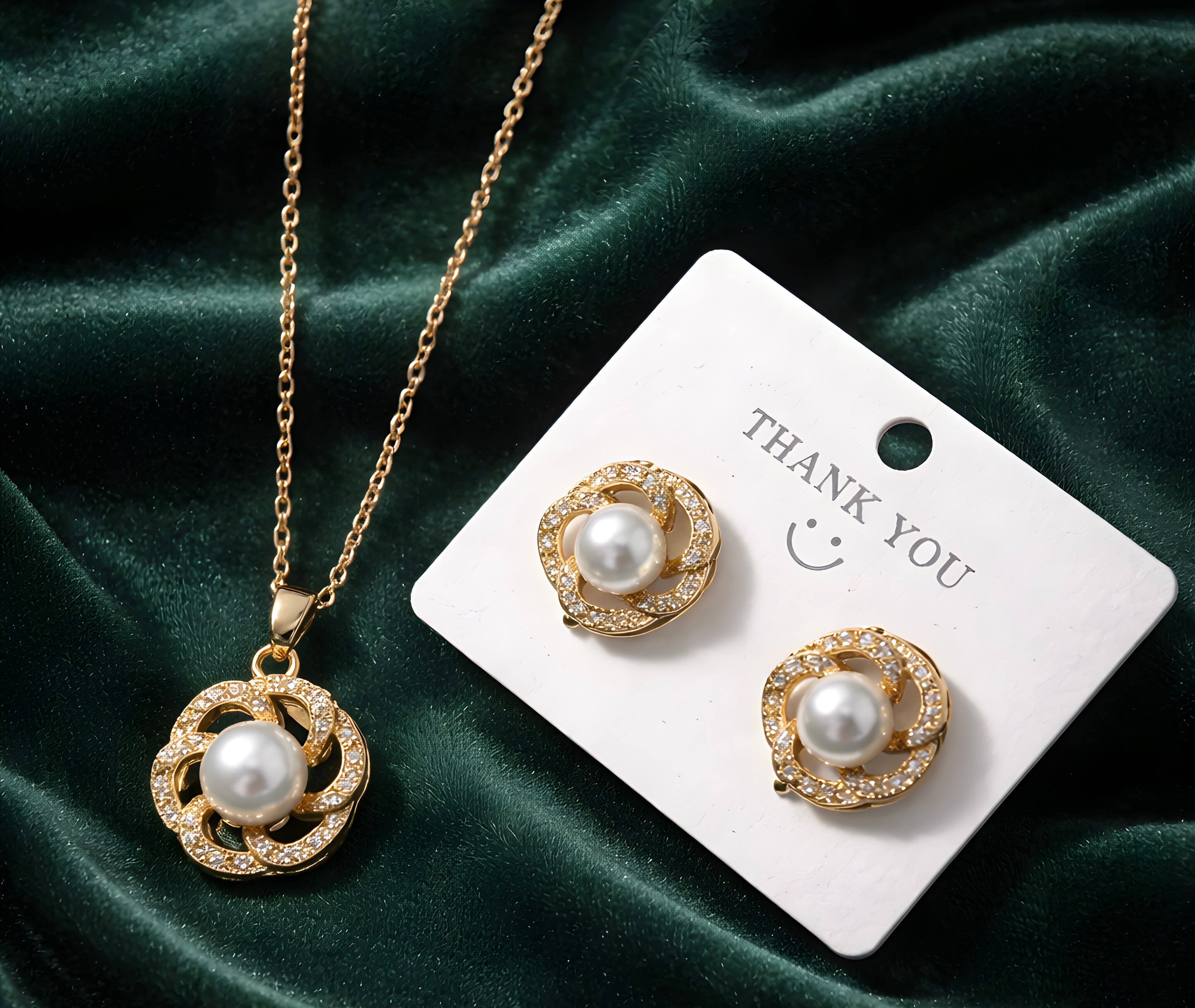 Pearl and gold-toned pendant set