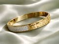Hermes gold bracelet