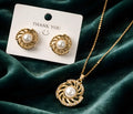 Spiral pearl pendant set