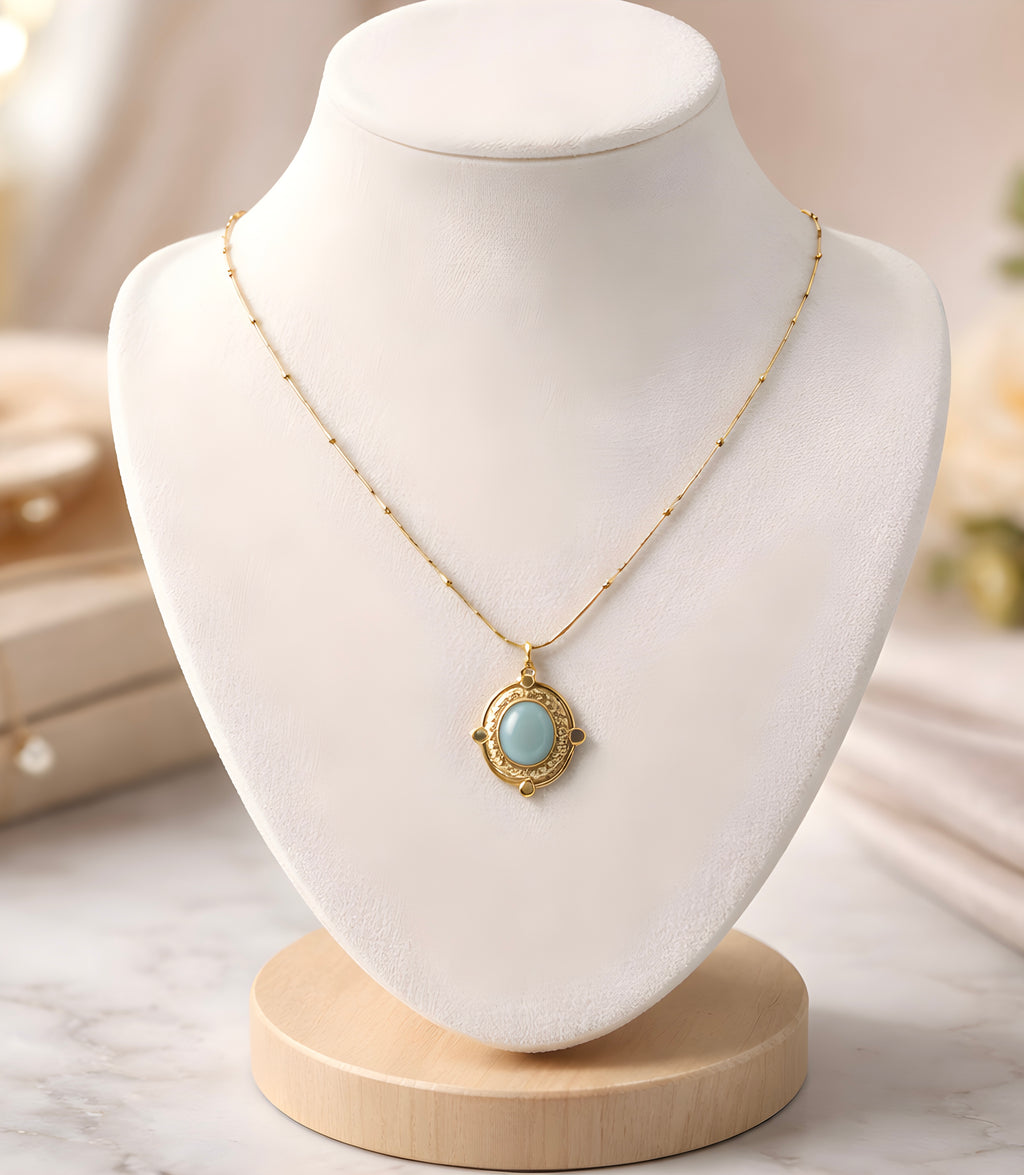 Oval cabochon-cut gemstone pendant