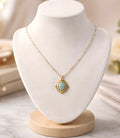 Oval cabochon-cut gemstone pendant