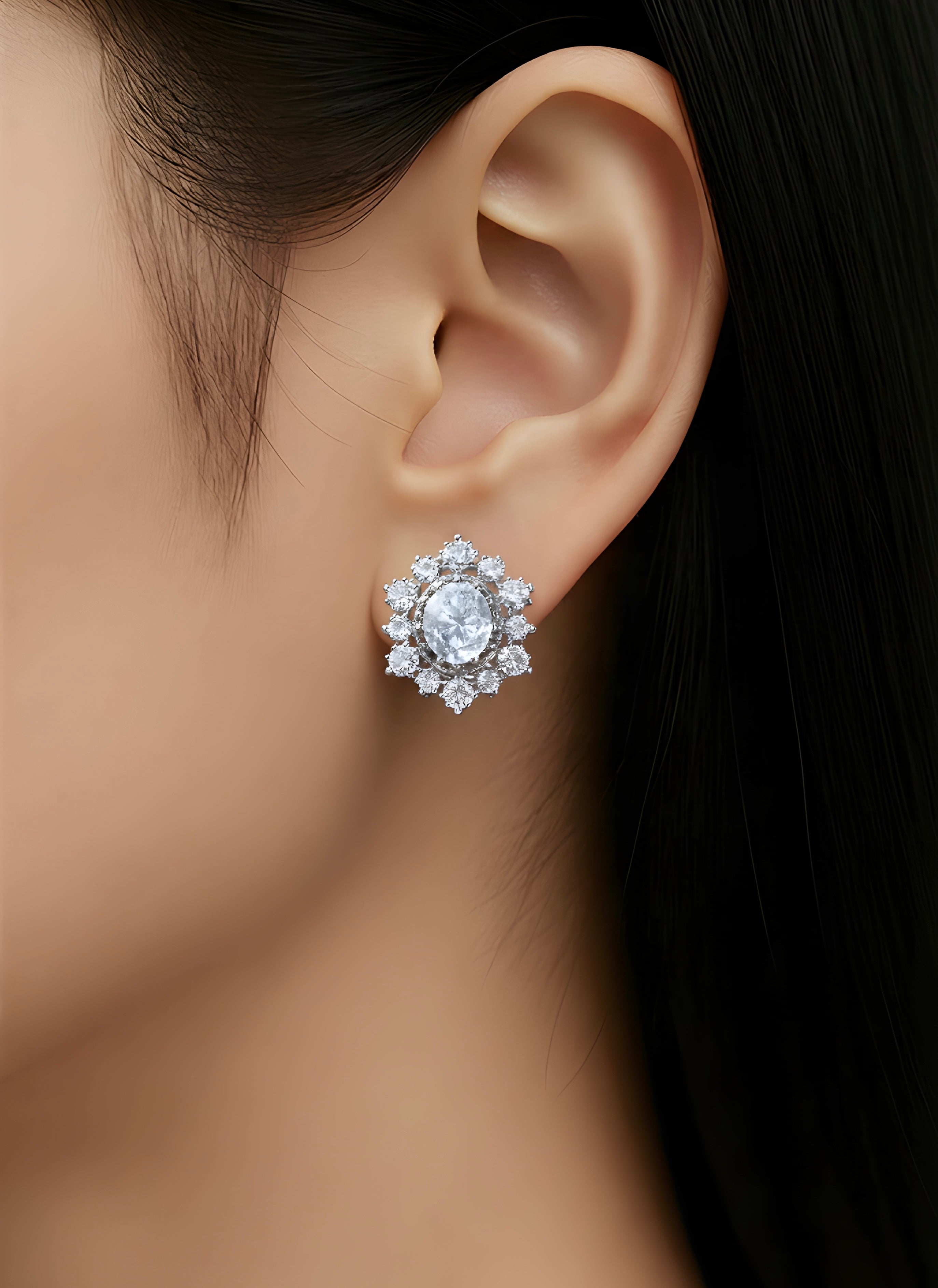 Oval-cut halo stud