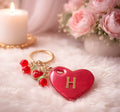 Personalized custom handmade resin heart-shaped keychain and gold-tone letter "H”