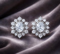 Oval-cut halo stud